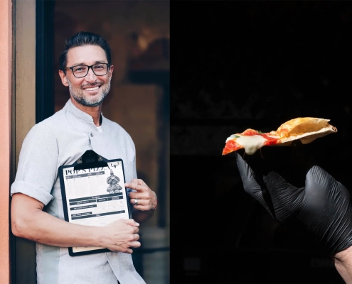 Greg Yurkovich, soustanovitelj POPS Aperitivo Ljubljana, s podpisano jedilno karto in gurmanskim koščkom pice – pogovor za revijo David – revija za moške s stilom. / Greg Yurkovich, co-founder of POPS Aperitivo Ljubljana, holding the signature menu and showcasing a slice of gourmet pizza – featured in David, men's magazine with style.