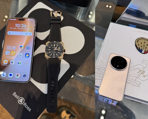 HONOR Magic8 Pro pametni telefon ob luksuzni uri Bell & Ross na mizi.